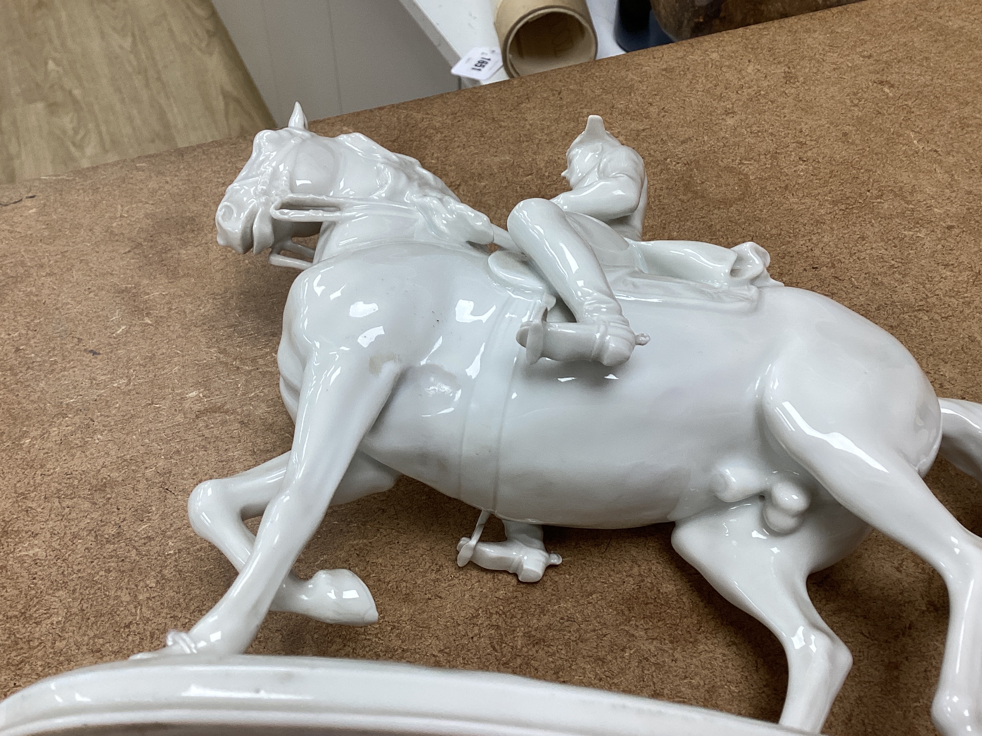 An Augarten, Wien white glazed porcelain Spanish Riding School Group, 24cm